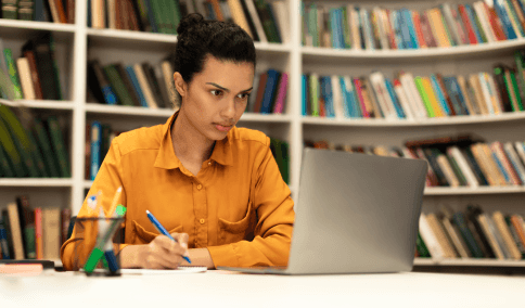 A student scans a transcript while Haitian Creole Translation Services in New York City prepare an academic version.