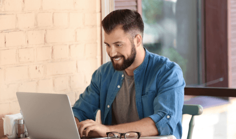A client requests a free quote form on a laptop, using Translation Services in Bushwick with guaranteed acceptance.
