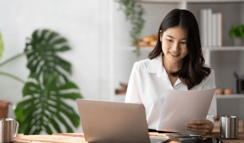 A project coordinator uploads files to a portal, ordering Translation Services in Washington Heights for business document.