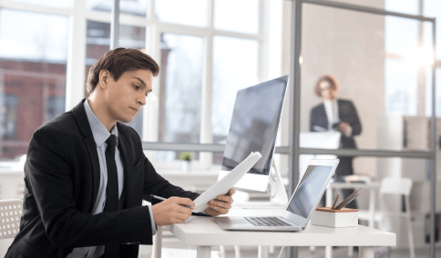 A project manager assigns files to experts for Translation Services in Brooklyn, tracking document translation stages and QA.