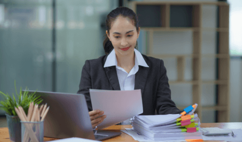A manager checks Haitian Creole Translation Services in New York City for a business contract before signing.