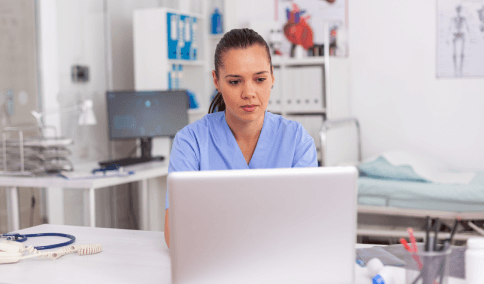 A medical translator checks patient records for accuracy, using Translation Services in Jackson Heights for safe care.