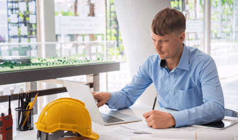 A linguist checks engineering drawings and notes, using Translation Services in Jackson Heights for technical files.