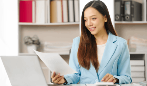 A translator working on a Birth Certificate translation in multiple languages, including Spanish, Chinese and Arabic.