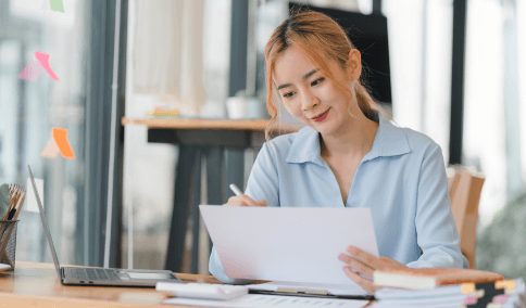 A native linguist compares two pages during Translation Services in Manhattan to keep personal wording accurate and clear.