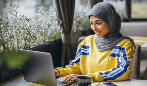 A student checks a translated transcript PDF, using Arabic Translation Services in New York City for academic records.
