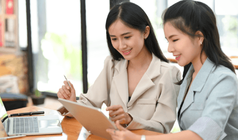 Clients using a tax return translated with certified Korean Translation Services in New York City for filing.