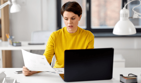 A client reviews a USCIS checklist while ordering Spanish Translation Services in New York City with certification.