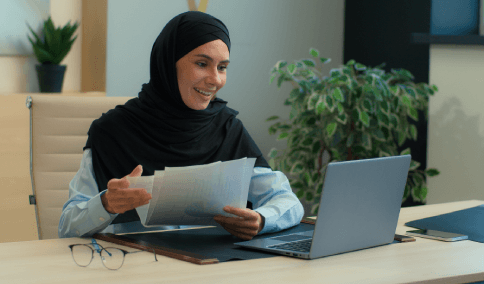 A staff member prepares an official documents quote sheet, explaining Arabic Translation Services in New York City costs.