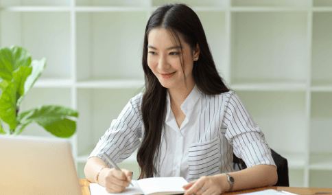 A linguist finishes same-day day translations for Translation Services in Astoria, polishing a contract before the deadline.